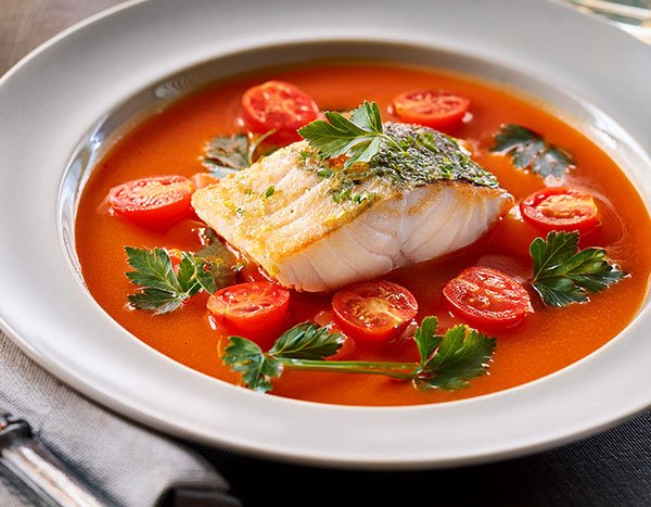 East Coast halibut with heirloom tomato consommé