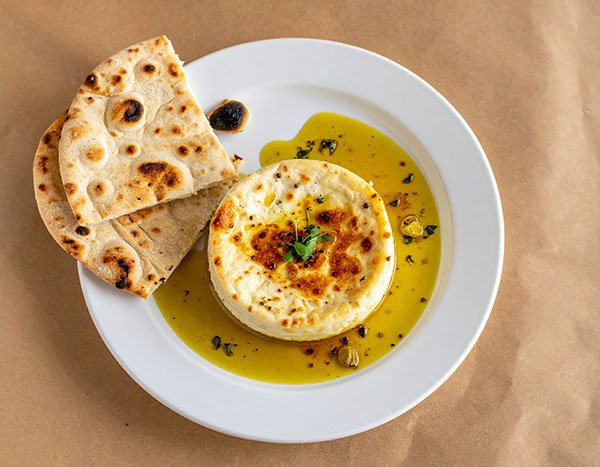 baked goat cheese with warm flatbread